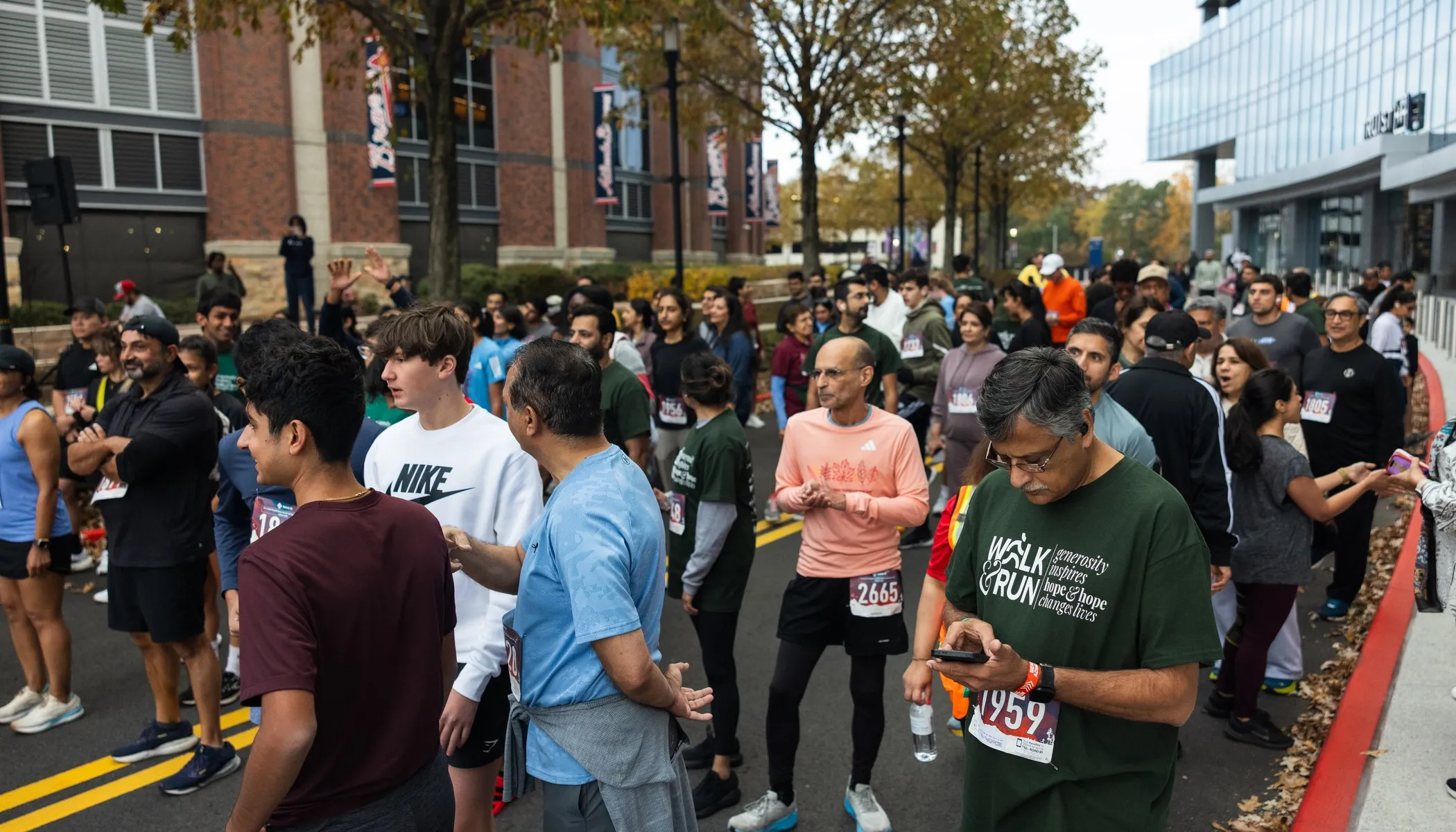 Walkers gathered at the start outside Truist Park